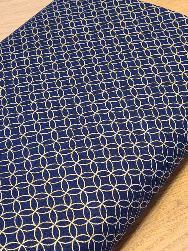 Tissu Shippô dorés sur fond indigo (prix pour 10cm)